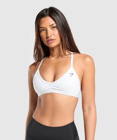 Nike Pros And Sports Bras, Gym Shark Sport Bras, White Sports Bra For Athleisure, Gym Shark Bra, White Gym Bra With Medium Support, White Medium Support Gym Bra, Sporty White Bra For Workout, White Medium Support Workout Bra, Sporty Supportive White Bra