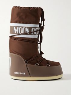 Moon Boot's lightweight, water-resistant snow boots are designed to keep feet toasty in temperatures as low as -31°F. Made from shell and paneled with synthetic material, they have gripped soles to help you navigate icy ground, while the drawstring cuffs ensure a snug fit. Brown Moon Boots, Brown Moon, Vintners Daughter, Leather Snow Boots, Moon Boot, Moon Boots, Classic Shoes, Fall Shopping, Ski Wear