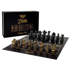 the legend of zelda chess set is shown in front of an open black box