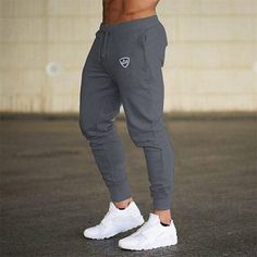 Fabric:Polyester; Gender:Men's; Style:Athleisure; Occasion:Sports Outdoor; Fit Type:Regular Fit; Waistline:Mid Waist; Pattern:Geometric Pattern; Design:Elastic Waist,Drawstring; Pants Type:Track Pants,Trousers,Sweatpants,Joggers,Joggers; Front page:FF; Listing Date:03/01/2022; Hips:; Length:; Waist:; Fit US Size:null; Fit UK Size:null; Fit EU Size:null Sportswear Joggers, Jogging Pants Men, Mens Running Pants, Workout Sweatpants, Celana Fashion, Bodybuilding Clothing, Gym Workouts For Men, Pants Jogger, Sweat Workout