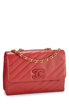 This Chanel bag features a quilted design, a flap closure with a turn lock, a gold tone chain strap, and the Chanel logo on the front.