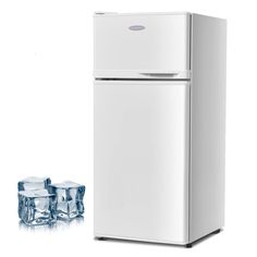 a white refrigerator freezer sitting next to two ice cubes