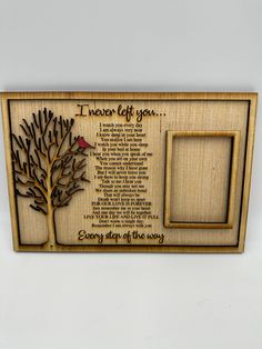 a wooden plaque with a tree and poem on the front that says, i never get you