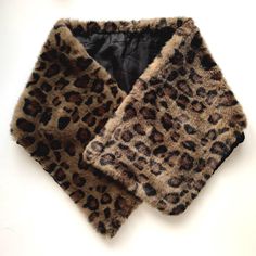 Vintage Faux Fur Stole Faux Fur Animal Print Scarf Fluffy Leopard Print Wrap Scarf / Stole Vintage clothing Vintage accessories Wear leopard print faux fur stole with your winter coat and dress up your outdoor look In real life, the scarf is darker in color and more of a cocoa shade than brown. * Soft, smooth faux fur * The reverse of the scarf is the fabric. * Great vintage condition. Measurement 39'' inches / 100 cm long and 9''inches / 23 cm width. ☆ SHIP WORLDWIDE ☆ I ship from Latvia EU wor Coat And Dress, Outdoor Look, Faux Fur Stole, Fur Animal, Animal Print Scarf, Fur Stole, Wrap Scarf, Clothing Vintage, Vintage Accessories