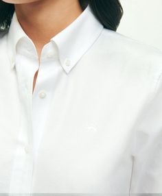 Our shirt is crafted from Oxford cotton with our signature button-down collar and 6-Pleat Shirring® at the cuff, for a nod to timeless American style. Classic silhouette that is straight in the bodyEmbroidered logo at chest100% CottonMachine washImported | Women's Classic-Fit Cotton Oxford Shirt | White | Size 2 Classic Button-up Dress Shirt For Daywear, Classic Button-up Shirt For Daywear, Classic Shirt With Button Closure For Daywear, Classic Dress Shirt For Office With Relaxed Fit, Classic Relaxed Fit Dress Shirt For Office, Classic Relaxed Fit Dress Shirt With Placket, Classic Collared Workwear Shirt, Classic Collared Shirt For Work, Classic Relaxed Fit Dress Shirt For Daywear