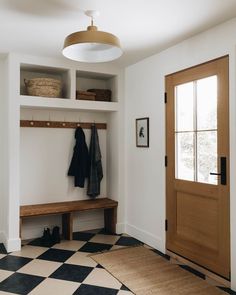 the entryway is clean and ready to be used as a mudroom or dressing room