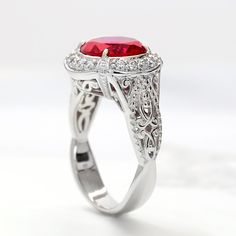 Women Sterling Silver Art Deco Design 2.5 carat Simulated Ruby Engagement Ring This beautiful Sterling Silver Art Deco Design 2.5ct Simulated Ruby Engagement Ring by DoubleAccent is meticulously crafted in gleaming and durable Sterling Silver. Our stones are the highest quality diamond simulants that are polished, finely cut, loupe clean, and have an exactly similar appearance and as beautiful as to naturally occurring diamonds. All cubic zirconia stone weights are approximate and listed as diam Gia Certified Red Diamond Ring For Formal Occasions, Classic Red Cluster Ring For Formal Occasions, Classic Red Diamond Cluster Ring, Formal Ruby Ring For Valentine's Day With Round Cut, Red Ruby Ring With Halo Setting For Formal Occasions, Ruby Ring With Round Stone, Red Cluster Ring With Prong Setting For Formal Occasions, Formal Red Cluster Ring With Prong Setting, Red Ruby Birthstone Ring