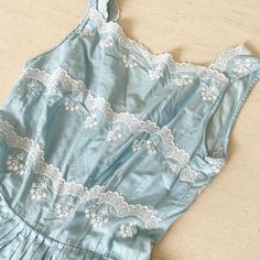 "Baby blue beauty. This super sweet light cotton frock has cotton scallop lace details on its bodice that really brings it to next level loveliness. Back metal zip. Condition: Excellent Label: None. Well made. Bust 33/34\" Waist 24\" Length 39\" (4\" to let) This item is clean and ready to wear. Comes from a smoke and pet free home. Don't forget to follow me on Instagram @tammaraclearshercloset for new listing alerts. This is shipping from Singapore. Standard post to the US takes about 10 workin Summer Cotton Dresses With Scalloped Lace, Summer Cotton Dress With Scalloped Lace, Spring Cotton Dress With Scalloped Lace, Fitted Light Blue Dress With Lace Trim, Sleeveless Cotton Dress With Lace Trim, Cotton Summer Dresses With Scalloped Edges, Spring Cotton Dresses With Scalloped Edges, Cotton Scalloped Lace Fitted Dress, Fitted Cotton Dress With Scalloped Lace