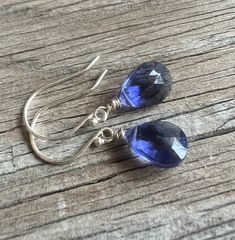 Purple Tanzanite quartz earrings, sterling silver, petite drops, birthday gemstone jewelry.  Handcrafted, petite Tanzanite Quartz dangles in sterling silver .925. Beautiful, faceted, blue purple or periwinkle gems hand wire wrapped to sterling silver French hooks. The earrings are about 1 inch long, each stone is small, approximately 8 x 12 mm.  September and December birthday gift.  To customize, contact VERAIDAGIFTS: Available in 14k gold fill, Rose goldfill, sterling silver and oxidized silver. The earwire can be changed to a different one. Matching necklaces available as well to complete the set: earrings and necklace (standard 18 inches long chain).  These beautiful and feminine earrings will arrive in a complimentary, beautiful jewelry box ready for gift giving. Dainty Sterling Silver Crystal Earrings For Everyday, White Gold Sterling Silver Crystal Earrings For Gift, Hypoallergenic Sterling Silver Crystal Earrings For Everyday, Everyday Hypoallergenic Sterling Silver Crystal Earrings, Fine Jewelry Briolette Earrings As Gift, Sterling Silver Teardrop Crystal Earrings For Anniversary, Silver Sterling Silver Teardrop Earrings, Teardrop Sapphire Sterling Silver Jewelry, Gemstone Drop Earrings For Anniversary