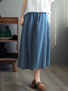 This retro denim mid-length A-line skirt combines classic style with modern flair for a look that's timeless and bold. Crafted from a durable, breathable fabric, its tailored shape looks flattering on a variety of body types, making it the perfect all-match item for your wardrobe. Look effortlessly chic in this statement-making piece that will endure all day and keep you looking stylish.