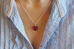 Full of Sparkles, Heart Shaped Red Cubic Zirconia suspended on Sterling Silver 18" length chain. Only one piece made for that special someone! Wrapped in Belesas Branded Box ready for gift giving.(n201)The lovely heart measure 15mm x 12mm*LIKE* us on Facebook http://www.facebook.com/Belesas to find special coupon codes,*FOLLOW* us on Twitter https://twitter.com/#!/Belesas to get more exclusive coupon codes*All item are ready to ship! Free shipping on orders over $150 using coupon code BELESAS150 Red Crystal Necklace For Valentine's Day, Red Heart Necklace With Birthstone For Gift, Red Heart Necklace With Birthstone As Gift, Red Heart Pendant Necklace For Wedding, Red Heart Birthstone Necklace Gift, Red Birthstone Heart Necklace For Gift, Red Necklace For Valentine's Day Anniversary, Red Necklace For Anniversary Gift On Valentine's Day, Red Heart Charm Necklace For Wedding