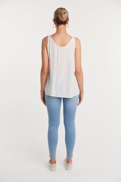 We love our basics! They are our wardrobe staples and are the go to fashion reliable faves. This Basic Tank is the perfect addition, as you can layer it with any outfit or wear it under a cardigan or sweater. This Basic Tank can also be worn on its own as the weather gets warmer. Fall Day Out Viscose Tops, Chic Stretch Blouse For Everyday, Chic Everyday Stretch Blouse, Effortless Viscose Tops For Spring, Versatile White Tank Top For Layering, Chic Viscose Tops For Layering, Versatile Tank Top For Fall Day Out, Versatile Fall Tank Top For Day Out, Spring Layering Stretch Blouse