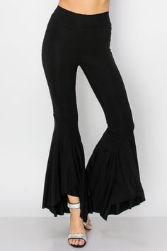 Vocal Soft gentle swirl petal flap ankle design bell bottom legging pants. Sleek, classy and soft. Banded waistband 2 1/2" not foldover. High rise. Stretchy fabric. Classic and dressy. Cozy soft and comfy. If you want to make a statement these are for you!Color: Black Sizes: S-M-L-XL Approximate sizing: Waist Small 24 Medium 28 Large 32 XL 34, inseam 31-32", high rise 12-13", width of bell on L is 29" across flatOver 1 lb. Self: 92% Rayon, 8% Spandex Hand wash cold, imported H/20031P Chic Stretch Flares For Night Out, Trendy Black Flared Hem Bottoms, Elegant Fitted Bottoms With Flared Cuffs, Trendy Black Flared Hem Pants, Black Flared Hem Pants For Party, Fall Night Out Flared Hem Pants, Black Fitted Bottoms With Flared Hem, Fall Night Out Flares With Flared Hem, Fall Flares With Flared Hem For Night Out