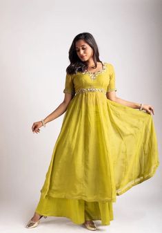 Anarkali suit usa / anarkali kurta full sleeve  / Indian dress with ombré dye/embroidered anarkali/Indian dresses / voggish / anarkali         Looking for a perfect indian dress/anarkali/suit sets that are trendy, unique and easy to carry !! yess, You are at the right place. we carry such versatile pieces of anarkalis and suit sets, kurtas that really let you stand out in any occassion !!      featuring this beautiful light mehendi green anarkali that has hand embroidery all over at the body and sleeves as shown paired with loose Polazzo / sharara pants as shown !! A very classy, beautiful yet unique look makes your occasion so Perfect !! Ready to ship in USA !! perfect for mehendi wedding outfit , can be customized in colors and patterns !! Details :  - color : light mehendi green   - Dre Floor-length Pista Green Chanderi Kurta, Green Floor-length Palazzo Set For Navratri, Pista Green Floor-length Chanderi Kurta, Pista Green Anarkali Kurta Floor-length, Pista Green Chanderi Floor-length Kurta, Anarkali Style Floor-length Pista Green Palazzo Set, Floor-length Pista Green Kurta With Gota Work, Designer Wear Pista Green Maxi Kurta, Floor-length Pista Green Sharara For Designer Wear