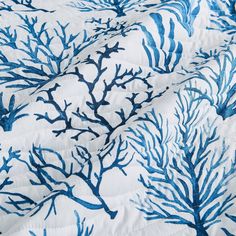 the blue coral print on this quilt is very soft