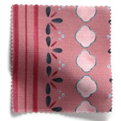 a pink and black fabric with designs on it