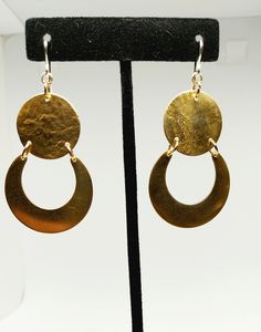 Hand-crafted brass earrings, approximately 2" inches in length. Ear hooks are .925 Sterling silver. Artisan Long Drop Gold Jewelry, Artisan Long Drop Nickel-free Earrings, Crescent Hammered Earrings, Artisan Dangle Earrings With Ear Wire, Modern Gold Moon Shaped Jewelry, Modern Gold Moon-shaped Jewelry, Gold Moon Shaped Hoop Earrings, Gold Moon-shaped Metal Hoop Earrings, Gold Moon Shaped Metal Hoop Earrings