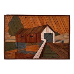 a painting of a barn on a wooden wall