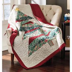 a quilted christmas tree sitting on top of a chair