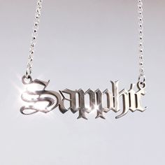 Sapphic Necklace ☾ In honor of legendary poet and writer, Sappho, from the island of Lesbos. Necklace is solid .925 sterling silver & measures approx 1.5 in. wide x less than half an inch tall. Chain measures 16" long but can be made shorter upon request (leave a note at checkout with your desired chain length). ❋ ❋ This item is hand crafted for each order and requires approx 2-4 weeks for production and shipment. If you have a deadline, please reach out ahead of time and we would be happy t Engraved Sterling Silver Necklace, Custom Engraved Sterling Silver Necklace, Sapphic Jewelry, Silver Engraved Nameplate Necklaces, Elegant Silver Name Necklace With Engraving Option, Engraved Silver Nameplate Jewelry, Personalized Symbolic Silver Jewelry, Sterling Silver Name Necklace With Engraving Option, Wlw Jewelry