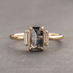 black diamond Speckled Diamond Engagement Ring, Unique Black Wedding Rings, Gold Black Engagement Ring, Black Band Engagement Ring, Black And Gold Wedding Ring, Unique Emerald Cut Engagement Rings, Black Stone Engagement Ring, Unique Black Diamond Engagement Ring, Non Diamond Engagement Rings