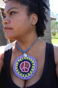 Handmade crochet necklace/Choker in Denim and with Peace sign granny (circle) motif and Shell detail. Silver Chain and clasp for back closure. Spring Summer Boho style. Casual/Beach/Statement/Festival/Jewellery 100% Cotton. In Denim. One Size Peacekeeper Mandala Pattern by Starlily Creations (Etsy) Handmade with Love by Kinyonga (Spain). Handmade Retro Necklaces For Festival, Retro Handmade Necklaces For Festival, Handmade Retro Necklace For Festivals, Handmade Retro Necklace For Festival, Retro Handmade Necklace For Festival, Retro Adjustable Choker For Festivals, Adjustable Retro Festival Choker, Summer Festival Retro Jewelry, Retro Summer Festival Jewelry