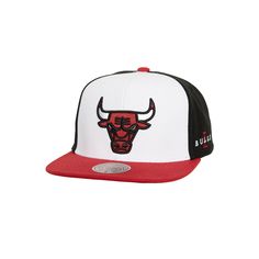 the chicago bulls snapback hat is shown in white and black with red brim