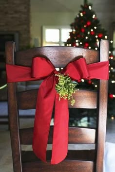 a wooden chair with a red bow tied to it's back and the words, talk to your local insurance expert today