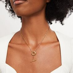 Curate your collection of easy-to-style accessories with this Soko Obiti Lariat necklace. Brass with 24K gold plate This lariat design features a toggle clasp - suspended beneath a chain dangle that threads through an open circle 19.53-inch paperclip chain; toggle clasp Handcrafted by artisans in Kenya using traditional techniques Designed for and exclusively available at Zales Modern Gold Lariat Necklace With Adjustable Chain, Elegant Brass Toggle Clasp Necklace, Yellow Gold Toggle Necklace With Round Gold Chain, Classic Yellow Gold Plated Toggle Necklace, Classic Yellow Gold-plated Toggle Necklace, Tarnish Resistant Gold Plated Yellow Gold Toggle Necklace, Tarnish Resistant Gold Plated Toggle Necklace, Elegant Gold Plated Toggle Necklace With Round Pendant, Minimalist Gold Plated Toggle Necklace