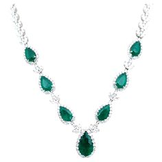 Check out this one-of-a-kind emerald necklace! The necklace features 7 natural Colombian emeralds weighing 10.25 ct and round brilliant cut diamonds weighing 17.3 ct set in 18k white gold. A gorgeous showstopper!! Luxury Pear-shaped Emerald Gemstone Necklace, Exquisite Pear-shaped Emerald Necklace For Formal Occasions, Dazzling Formal Emerald Gemstone Necklace, Luxury Green Diamond Gemstone Necklace, Luxury Green Diamond Necklace With Gemstone, Luxury Green Gemstone Diamond Necklace, Exquisite Green Diamond Necklace, Emerald Diamond Necklace For Formal Occasions, Luxury Green Diamond Necklace For Anniversary