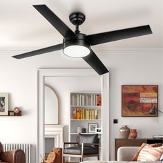 a black ceiling fan in a living room