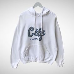 Vintage City Football White Hoodie Sweatshirt Size Medium City Football Crewneck City Football Sweater Pullover Spell Out Print Logo Jumper by brixtonclothing on Etsy Oversized White Varsity Sweatshirt, White Oversized Varsity Sweatshirt, White Long Sleeve College Sweatshirt, White Long Sleeve Sweatshirt For College, White Oversized Sweatshirt For Sports Season, White Long Sleeve College Sweater, White Long Sleeve Sweater For College, White Hooded Sweater With Letter Print, White Letter Print Sweatshirt For Winter