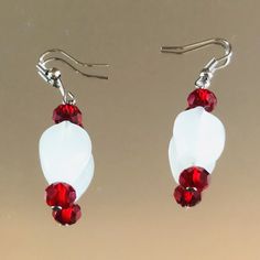 Red and white handmade beaded earring for all occasions White Czech Glass Beaded Dangle Earrings, Elegant White Beaded Earrings With Czech Glass, Handmade White Dangle Crystal Earrings, Handmade White Crystal Dangle Earrings, Elegant White Czech Glass Beaded Earrings, White Beaded Czech Glass Earrings, White Czech Glass Dangle Earrings, White Crystal Drop Earrings With Ear Wire, White Dangle Earrings With Faceted Beads