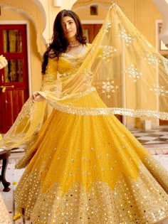 Luminous yellow lehenga choli and dupatta radiate elegance, introducing our stunning yellow lehenga choli and dupatta that will light up any occasion. Price:- ₹4,199.00 Indian Wedding Lengha, Abhinav Mishra, Haldi Dress, Mirror Work Lehenga, Haldi Outfits, Haldi Outfit, Lehenga Choli For Women, Choli For Women, Indian Outfits Lehenga