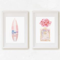 two framed art pieces with pink flowers and a surfboard on the wall next to each other