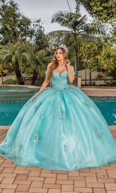 Long aqua blue a-line quinceanera ball gown with off the shoulder straps and sweetheart neckline. Quincenera Dresses Turquoise, Quinceanera Dresses Aqua, Quinceanera Dresses Teal Turquoise, Aqua Quinceanera Dresses, Teal Quinceanera Dresses, 1850 Dress, Light Blue Quinceanera Dresses, Knot Board, Princess Jasmine Dress