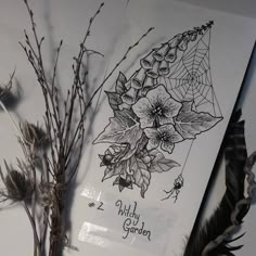 some flowers and plants are on display in a glass case with the words wild garden