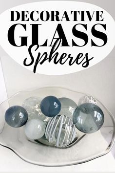 decorative glass spheres on a plate with the words decorative glass spheres above it in black and white