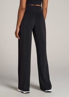 About Our Wide Leg Ultra High Rise Pant Comfort and style combine on these effortlessly chic pants for tall women. Designed with an ultra-high rise that's extra flattering, they have a modern wide leg with front seam details to highlight your long legs. We've made these tall women's pants specifically for your height, with a full length leg and inseam that's actually long enough. The tri-blend fabric is naturally wrinkle-resistant, and ready for a day of running errands or lounging at home. Two Chic High Waist Stretch Sweatpants, Full-length Elastane Bottoms For Business Casual, Business Casual Full-length Elastane Bottoms, Sleek Elastane Bottoms, Chic Wide Leg Relaxed Fit Sweatpants, Chic Relaxed Fit Wide Leg Sweatpants, Chic Fitted Wide-leg Sweatpants, Black Straight Leg Bottoms For Loungewear, Chic Full-length Elastane Yoga Pants