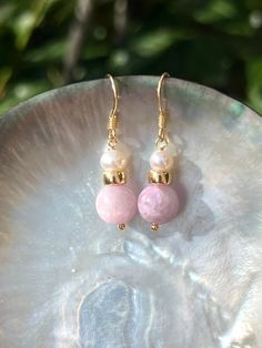 These cute dangle earrings will become a great gift for her on any occasion - for example, as graduation gift or Mother's day gift.  Made of two natural kunzite stones, freshwater pearls and gold filled beads. The ear wire are gold vermeil.  SPECIFICATIONS Length 3.5 cm Handmade in Spain Earrings come in a gift box Worldwide shipment with registered, trackable post Care for gold vermeil jewelry: avoid contact with humidity, swimming pool water and chemicals. Clean with soft dry polishing cloth. Pink Natural Stone Earrings For Gift, Mother's Day Pearl Drop Jewelry Gift, Mother's Day Gift Pearl Drop Jewelry, Handmade Pearl Earrings Gift, Handmade Pearl Earrings As Gift, Pearl Earrings With Round Beads For Gift, Pearl Earrings With Round Beads As Gift, Mother's Day Pearl Drop Dangle Jewelry, Mother's Day Dangle Pearl Drop Jewelry