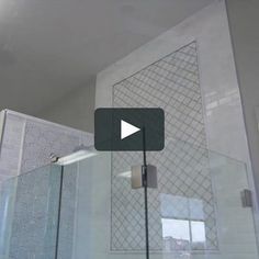 the inside of a bathroom with glass shower doors