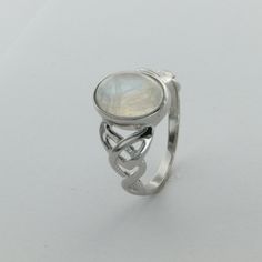 These is a beautiful pair of Sterling Silver Ring with a Rainbow Moonstone Gemstone. The ring are made out of solid 925 Silver and there is no nickel or other substances causing most allergies. This makes the ring hypo allergenic. Size of the Moonstone 1.2 x 0.8 cm or 0.47 x 0.31 inch You will receive the item in a gift box - perfect to surprise someone or yourself. Usually we ship on the same day we receive the payment for the order. We want you to be happy with your purchase. If you do not lik Mystical Silver Round Jewelry, Mystical Round Silver Jewelry, Adjustable Mystical Sterling Silver Rings, Adjustable Silver Mystical Crystal Ring, Silver Sterling Silver Moon-shaped Opal Ring, Silver Sterling Silver Moon Shaped Opal Ring, Silver Moon-shaped Sterling Silver Opal Ring, Sterling Silver Moon-shaped Jewelry For Anniversary, Adjustable Moonstone Jewelry With Round Stone