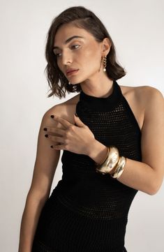 Embolden your stack with this polished bangle that's extracurvy and spangled with crystals of all shapes. 1 1/2" width 14k-gold plate/zircon Imported Gold-tone Bangle Bracelet For Party, Party Gold-tone Bangle Bracelet, Chic Yellow Gold Bracelets For Party, Gold Plated Bangle Bracelet For Party, Gold Bangle Bracelet For Evening, Gold-tone Bangle For Party, Gold-plated Yellow Gold Bangle For Parties, Gold Plated Cuff Bracelet For Party, Gold Plated Bangle Cuff Bracelet For Party