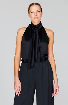 An elegant tie neck blouse cut in luxurious silk satin. The full ties can be worn loose down the back or draped around the neck and the elegant halter neckline is perfect worn alone or under a jacket. Satin Pajama Pants, Tie Neck Top, Tie Neck Tops, Evening Jackets, A Jacket, Pajama Pant, Tie Neck Blouse, Satin Pajamas, City Style