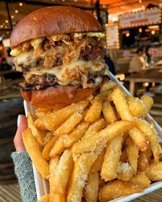 a hamburger and french fries on a plate