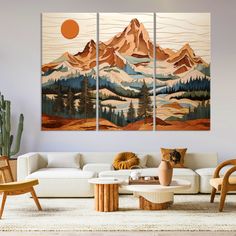 a living room with three paintings on the wall