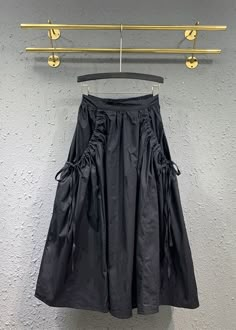 Black Cinched Pockets Elastic Waist Patchwork Cotton Skirt FallFabric: Cotton BlendedSize Fit: This garment fits true to size.Length: Size M measures 32.76"from waist to hem.Waist:Fitted - elastic waist allows stretch Hip: Loosely Fitted. room for hips. Hand Wash Cold.