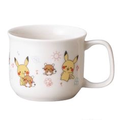 a white coffee cup with pikachu and friends on it