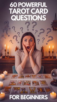 a woman sitting at a table surrounded by cards with question marks on it and candles in the background