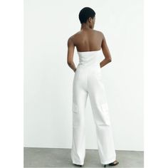 Zara White Jumpsuit White Casual Strapless Jumpsuit For Party, Chic Strapless Summer Jumpsuit With Pockets, Chic Strapless Jumpsuit With Pockets For Summer, Fitted High-waist Strapless Jumpsuit With Pockets, Fitted High Waist Strapless Jumpsuit With Pockets, Fitted Strapless Jumpsuit With Pockets For Summer, White Fitted Casual Strapless Jumpsuit, Chic White Strapless Jumpsuit For Summer, Fitted White Strapless Jumpsuit For Spring